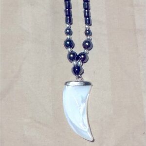 Hematite necklace Mother of pearl carved claw pendant
